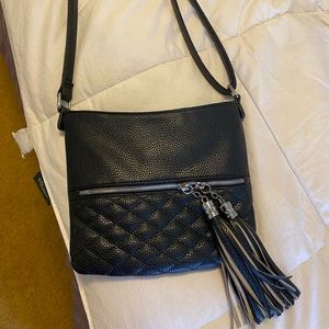 Black faux leather purse with adjustable strap